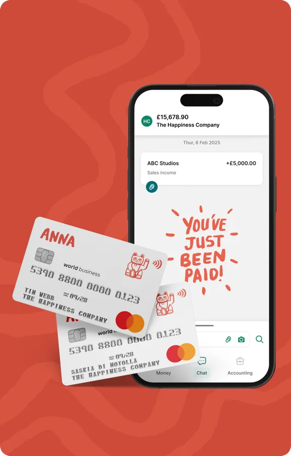 ANNA Mastercard business debit card alongside the ANNA app on a phone