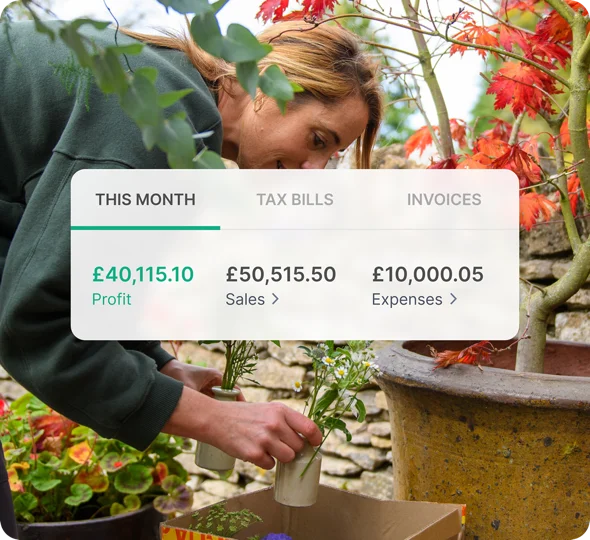 Florist viewing their ANNA dashboard showing this month’s profit, sales and expenses