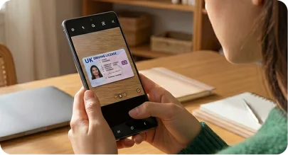 Person photographing their driving licence with the ANNA app