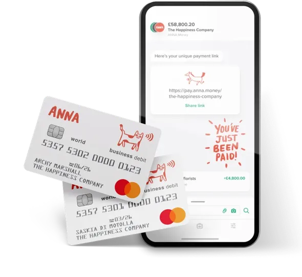 ANNA business account on a phone next to two ANNA debit Mastercards